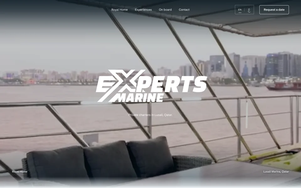 The live Experts Marine site: the wordmark over the houseboat’s upper deck and the Lusail skyline, with Request a date and an English and Arabic switch.